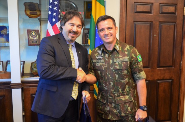 (From left) Col. Pedro Aires Pereira Jr., incoming deputy chief of the Brazilian Army Commission, meets with USASAC G4 Director Michael Casciaro June 15, 2021, after receiving an FMS overview at USASAC’s New Cumberland, Pennsylvania headquarters.