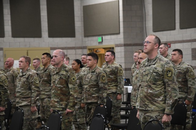 Col. Tammy Manwarring, commander, Utah National Guard’s COVID-19 Task Force, presents an award to a Soldier during a demobilization award ceremony at Camp Williams, Utah, June 16, 2021. After serving their state and communities for over a year,...