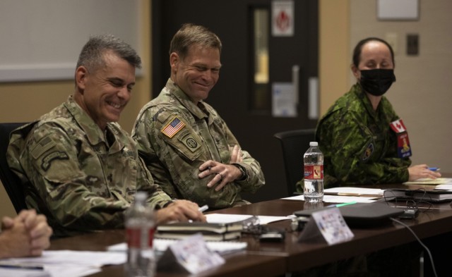 Maj. Gen. Matthew McFarlane, Commanding General, 4th Infantry Division, Col. Tobin Magsig, Commander, Joint Modernization Command, and Col. Marie-Christine Harvey, Commander, 5th Canadian Mechanized Brigade Group participate in the Joint Warfare Assessment 2021 media round table at Fort Carson, CO, June 24, 2021. The Joint Warfare Assessment is the Army’s annual modernization live field experiment/exercise to demonstrate and assess Multi Domain Operations Concepts, Capabilities, and AimPoint Formations at Echelon. (U.S. Army Photo by Spc. Tenzing Sherpa)