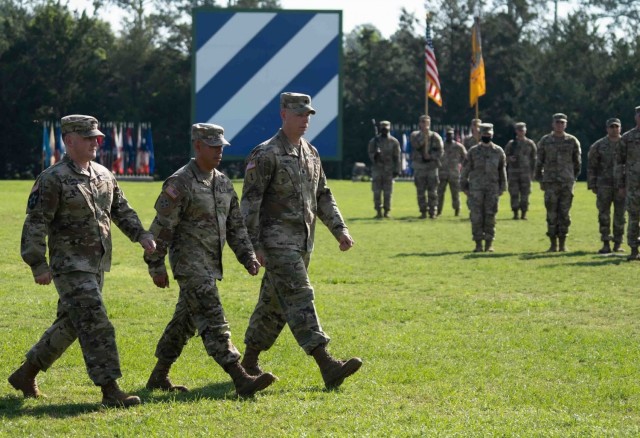 Lt. Col. Daniel G. Hodermarsky, left, incoming commander of the 3rd Battalion, 67th Armored Regiment, 2nd Armored Brigade Combat Team, Col. Terry R. Tillis, middle, commander of the 2nd Armored Brigade Combat Team, 3rd Infantry Division, and Lt. Col. Steven L. Chadwick, (right) outgoing commander, complete the inspection of troops during the 3rd Bn., 67 AR's change of command ceremony at Cottrell Field on Fort Stewart, Georgia June 16, 2021. (U.S Army Photo by Spc. Devron Bost)