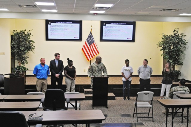 Col. Marvin Walker, Anniston Army Depot commander, introduces employees from the Upward Mobility Program during his town hall June 16.