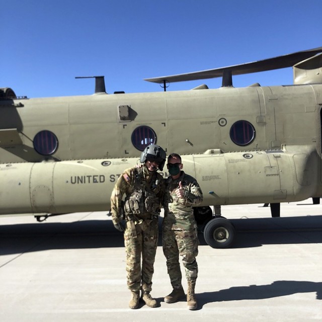 1st Lt. Bradley Cho, a platoon leader at Company B, 2-501 General Support Aviation Battalion, left, and his father-in-law, Lt. Gen. Daniel Karbler, commanding general, U.S. Army Space and Missile Defense Command, pose for a photo just before Cho...