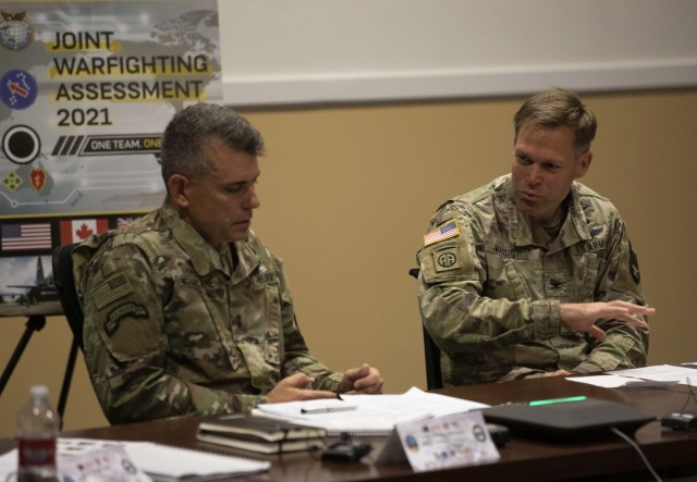 Col. Tobin Magsig, Commander, Joint Modernization Command answers a media members question as Maj. Gen. Matthew McFarlane listens during the Joint Warfighting Assessment 21 media round table at Fort Carson, CO, June 24, 2021. The Joint Warfare Assessment is the Army’s annual modernization live field experiment/exercise to demonstrate and assess Multi Domain Operations Concepts, Capabilities, and AimPoint Formations at Echelon. (U.S. Army Photo by Spc. Tenzing Sherpa)