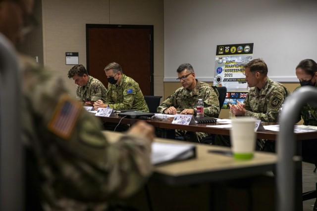 Members of multinational armies participate in the Joint Warfare Assessment 2021 media round table at Fort Carson, CO, June 24, 2021. The Joint Warfare Assessment is the Army’s annual  modernization live field experiment/exercise to demonstrate and assess Multi Domain Operations Concepts, Capabilities, and AimPoint Formations at Echelon. (U.S. Army Photo by Spc. Ethan Ford)