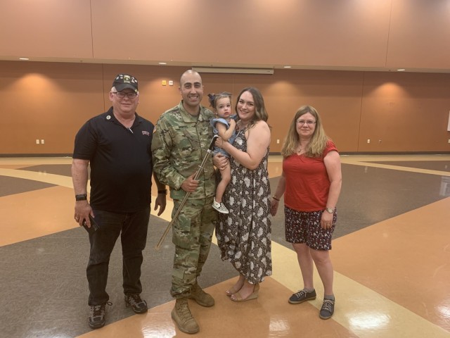 1st Lt. David Montes receives Major Thomas "Tom" Zeugner Leadership Award from Mr. Ross Bryant, University of Nevada, Las Vegas Director of Veteran Affairs, and wife Ms. Amy Lynn Frost, endowment creator on June 13, 2021 at the George W. Dunaway Army Reserve Center, in Sloan, Nev.