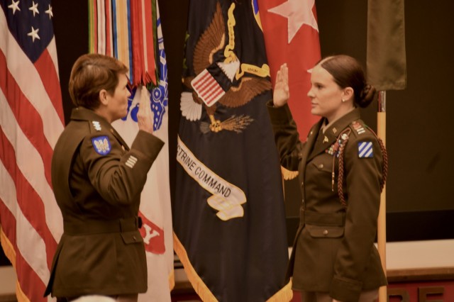 Lt. Gen. Maria Gervais' daughter, Cpt. Brandi Gervais, administers the Oath of Office during her promotion ceremony June 21, 201.