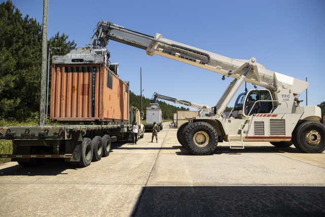 Brian McWilliams, an employee in Anniston Munitions Center’s Munitions Division, loads a 20 foot container prior to shipment of assets to another site within the Joint Munitions Command Munitions Enterprise.