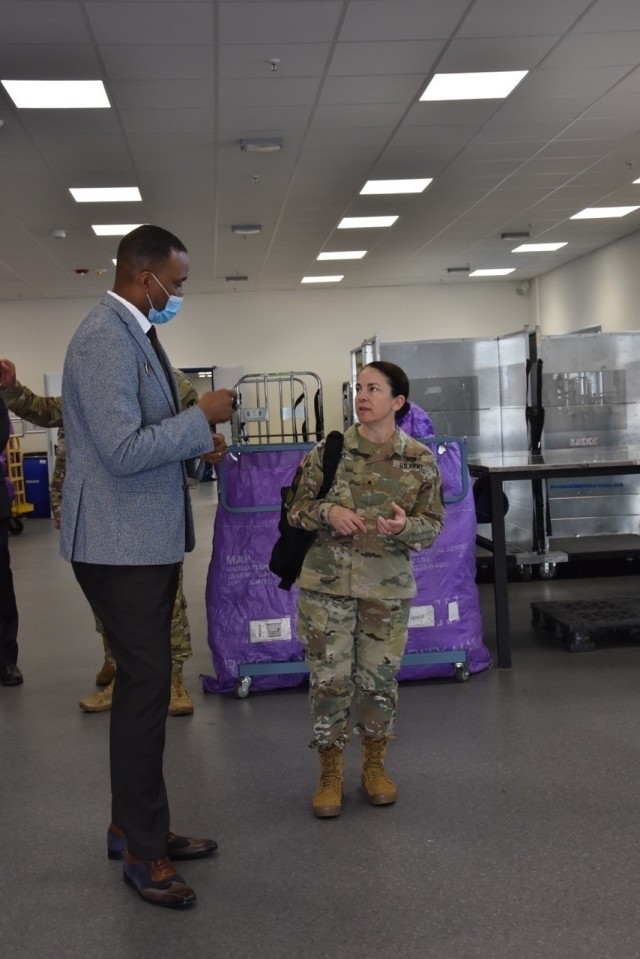 WIESBADEN, Germany— James E. McKee Jr., supervisory postal program specialist, briefs Brig. Gen. Hope C. Rampy, the Army’s Adjutant General, on the plan for the approved extension of the conveyor belt at the post office building that will...