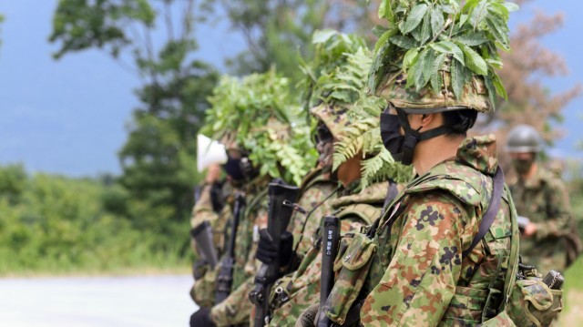 A member of Japan Ground Self-Defense Force’s 15th Rapid Deployment Regiment introduces squad members to U.S. Army Soldiers of 1st Battalion, 28th Infantry Regiment “Black Lions,” 3rd Infantry Division, June 25, 2021, on Aibano Training Area, Japan, during bilateral training as part of exercise Orient Shield 21-2. Orient Shield focuses on the development and refinement of the Japan Ground Self-Defense Force and U.S. Army’s efforts in the areas of bilateral planning, coordination and interoperability.