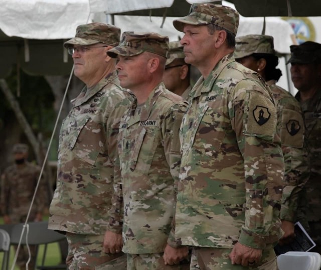 FORT BUCHANAN, P.R.—From left to right, Brig. Gen. Jeffrey W. Jurasek, Command Sgt. Maj. Michael Meunier and Command Sgt. Maj. Robert Breck during the change of responsibility at Fort Buchanan, Puerto Rico, June 26, 2021.