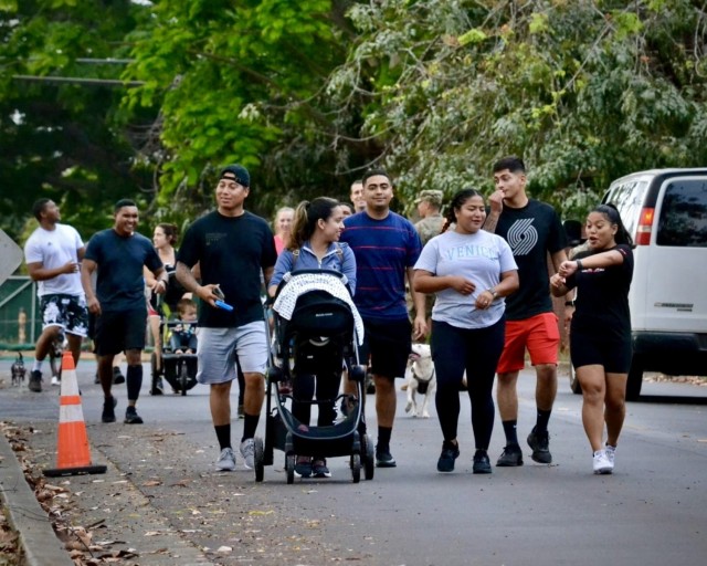 SCHOFIELD BARRACKS, Hawaii – Soldiers and Family members from 3rd Battalion, 7th Field Artillery participate in a family walk/run event as part of a four-day series of leader development, team-oriented, and Soldier-development events for the 25th Infantry Division Artillery's “People First Week” from June 21-24, 2021. The week was designed to “certify” leaders in how to care for Soldiers and Families, and advance ongoing initiatives to improve quality of life for the members of the “Tropic Thunder Ohana.” (U.S. Army Photo by 1st Lt. Robert Harrell)