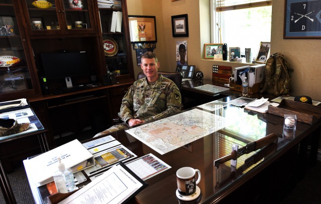 Col. CJ King sits at his desk in Fort Knox Garrison Headquarters, surrounded by mementos of his past 29 years of Army service. As he prepares to travel to his next destination, he took time to reflect on his command during some key pivotal moments...