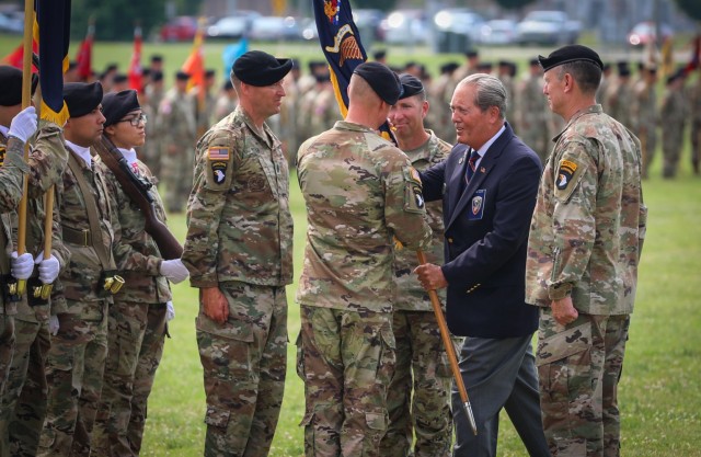 Col. Mark Federovich, incoming commander of the 3rd Brigade Combat Team, 101st Airborne Division (Air Assault), receives the regimental colours from Command Sgt. Maj. (Retired) Gerald Counts, the Honorary Colonel of the 187th Infantry Regiment, during a change of command ceremony on Fort Campbell, KY June 18, 2021. 

The passing of the regimental colours symbolizes the continuation of the historic lineage of the 187th linking the Soldiers of yesterday to those serving today. (U.S. Army photo by: Staff Sgt. Michael Eaddy)