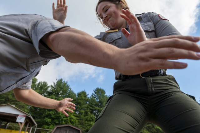 Elizabeth Mayo, park ranger for the U.S. Army Corps of Engineers Pittsburgh District, fends off an attack during a self-defense tactics class at Crooked Creek Lake in Ford City, Pennsylvania, June 15, 2021, as part of a five-day Visitor Assistance...