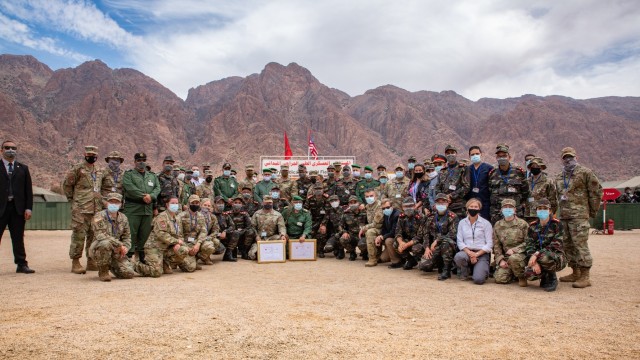 U.S. and Moroccan armed forces members pose for a group photo during African Lion 2021 June 16, 2021, at the Military Medical Surgical Field Hospital in Tafraoute, Morocco. African Lion 2021 is U.S. Africa Command's largest, premier, joint, annual...