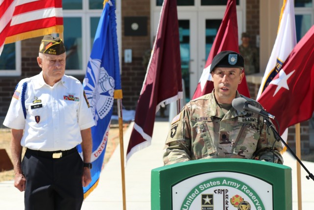 Left, Mr. Doug Miller, the master of ceremony, listens to remarks from Lt. Col. Joseph DaSilva, commander, 2nd Battalion, 327th Infantry Regiment, 1st Brigade Combat Team, 101st Airborne Division during the Spc. Jameson L. Lindskog U.S. Army Reserve Center memorialization ceremony June 29, 2021 at Parks Reserve Forces Training Area in Dublin, Calif. Lindskog, a resident of Pleasanton, Calif., was killed in action March 29, 2011 while serving as a combat medic with the 2nd Bn., 327th Inf. Regmt., 1st BCT, 101st Airborne Division in Afghanistan. He posthumously received the Silver Star for his heroic actions that day.
(Photo by Sgt. 1st Class Matthew Chlosta)