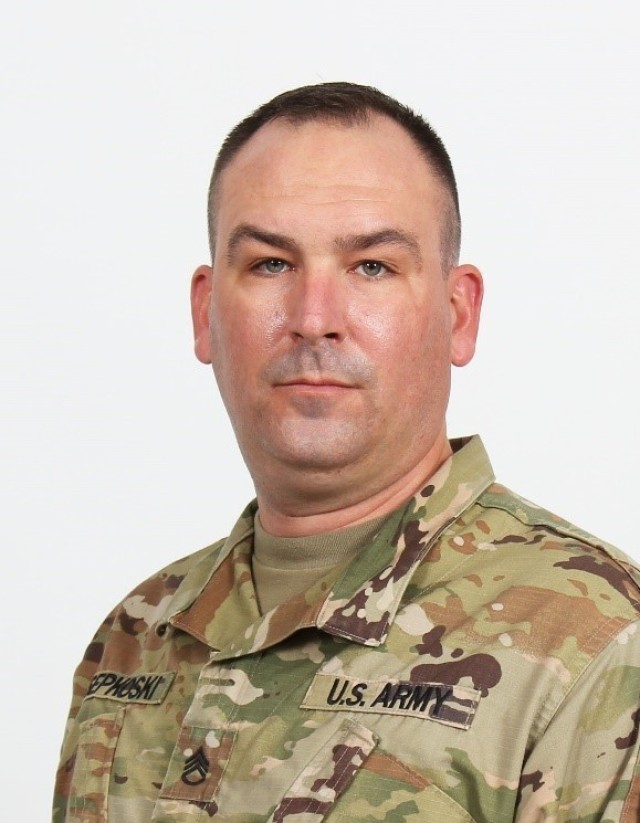Far East District Commander, COL Christopher Crary, presents SSG Timothy Sepkoski, Southern Resident Office Quality Assurance Rep, with an end-of-service award. Upon separation from the Army, Sepkoski will join SRO as a Civilian. (FED file photo)