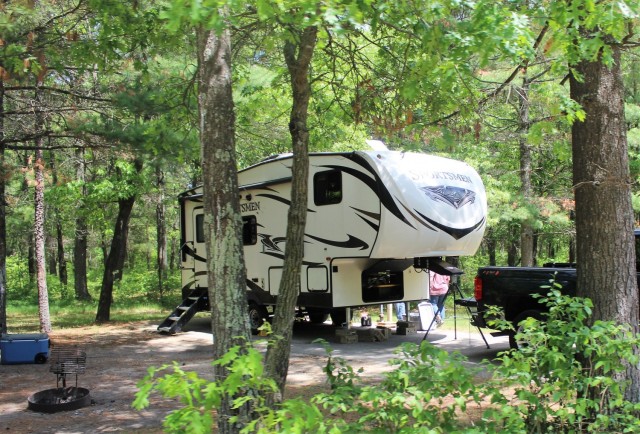A camper is shown June 2, 2020, at Pine View Campground at Fort McCoy, Wis. Open year-round, Pine View Campground is part of Pine View Recreation Area. This area also includes Whitetail Ridge and Sportsman’s Range. The campground is nestled in a...