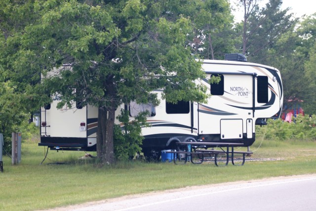 A camper is shown June 2, 2020, at Pine View Campground at Fort McCoy, Wis. Open year-round, Pine View Campground is part of Pine View Recreation Area. This area also includes Whitetail Ridge and Sportsman’s Range. The campground is nestled in a...
