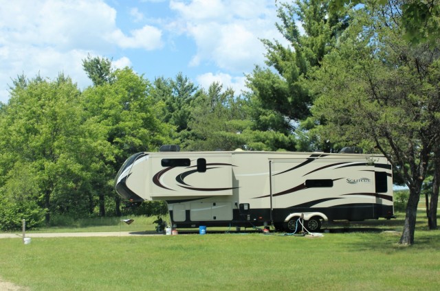 A camper is shown June 2, 2020, at Pine View Campground at Fort McCoy, Wis. Open year-round, Pine View Campground is part of Pine View Recreation Area. This area also includes Whitetail Ridge and Sportsman’s Range. The campground is nestled in a...