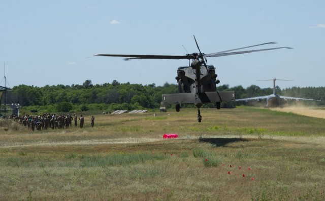 An Army UH-60 Black Hawk helicopter takes off from the Young Air Assault Strip on June 16, 2021 during the National Guard Patriot '21 exercise at Fort McCoy, Wis. Patriot ‘21 was a joint, interagency exercise sponsored by the National Guard...