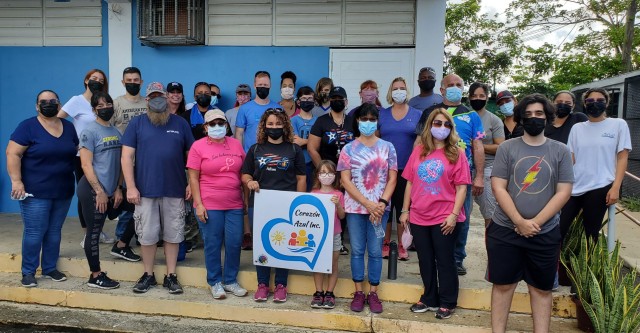 Fort Buchanan’s team and representatives from Corazón Azul pose for a group photo during the event held June 26, 2021 showing the satisfaction of a job well-done in support of the community of adults with severe autism.