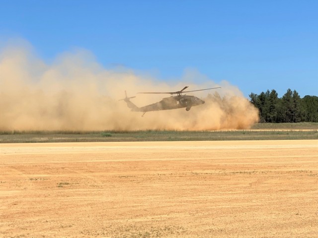 A National Guard UH-60 Black Hawk lands at Young Air Assault Strip on June 16, 2021, during operations for the Patriot ’21 exercise at Fort McCoy, Wis. Patriot ‘21 was a joint, interagency exercise sponsored by the National Guard Bureau (NGB)....