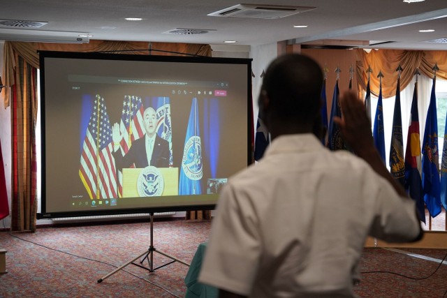 DHS Secretary of Homeland Security Alejandro Mayorkas virtually administered the Oath of Allegiance to 25 candidates at U.S. Army Garrison Bavaria&#39;s day one of naturalization ceremonies, June 30, 2021. (U.S. Army photo by Andreas Kreuzer /...