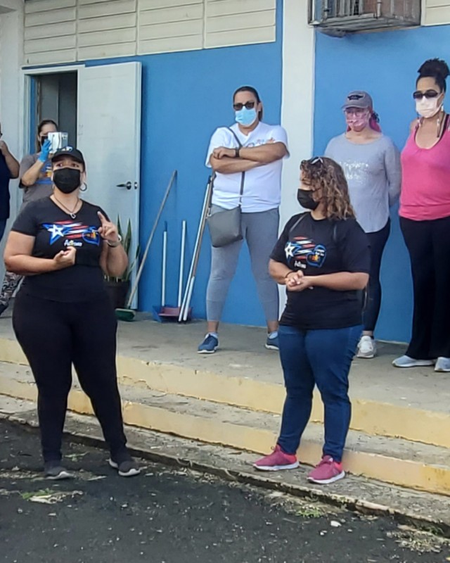 Corazón Azul Director, Vanessa Villegas addresses Fort Buchanan volunteers who went to support the non-profit organization cleaning and painting the facilities located in the municipality of Bayamón, where they will serve adults with severe autism to become more independent and productive persons.