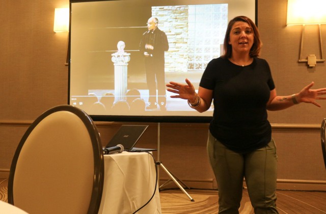 Master Sgt. Meaghan Bicklein, senior religious affairs advisor, 1st Theater Sustainment Command, explains a clip from a video to Soldiers attending the 1st TSC Strong Bonds retreat in Indianapolis, Indiana, June 29, 2021. (U.S. Army photo by Staff Sgt. Nahjier Williams, 1st TSC PAO)
