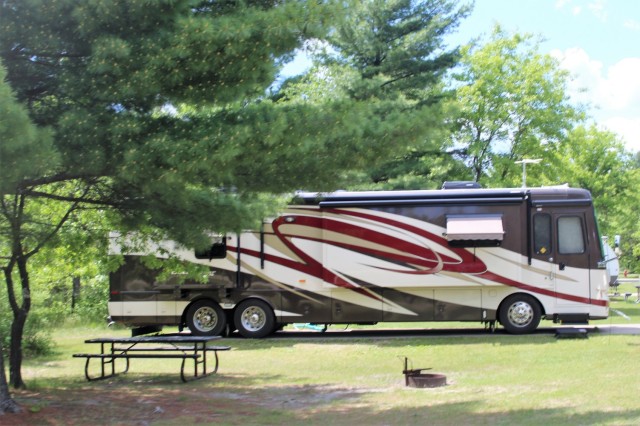 A camper is shown June 2, 2020, at Pine View Campground at Fort McCoy, Wis. Open year-round, Pine View Campground is part of Pine View Recreation Area. This area also includes Whitetail Ridge and Sportsman’s Range. The campground is nestled in a...
