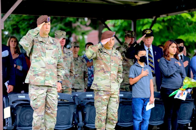 The Security Force Assistance Command&#39;s Commanding General, Maj. Gen. Scott Jackson, salutes the U.S. flag alongside the new 5th Security Force Assistance Brigade Commander, Col. Jonathan Chung, at the 5th SFAB&#39;s Assumption of Command ceremony, June 30, 2021 at Joint Base Lewis McChord, Washington.