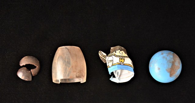 A Weebles toy found at a Fort McCoy archaeological site is shown July 18, 2016, in a past documentation photo at Fort McCoy, Wis. The artifact was found during a 30-year archaeology study of the installation. (Photo by the Colorado State...