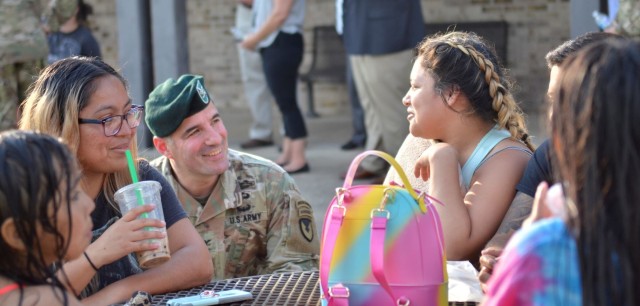 Colonel Jeremy D. Bell, Fort Campbell garrison commander, gathers feedback about on-post housing from residents during the installation’s first housing “walking” town hall, hosted June 16 in the Hammond Heights community.