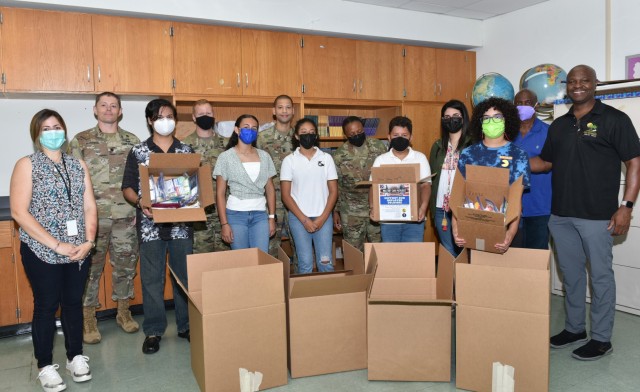 The initiative was a joint effort between AMS and USAG Fort Buchanan Religious Support Office (RSO). Garrison Command Chaplain (Maj.) David S. Keller contacted a deployed Chaplain to distribute the care packages downrange.