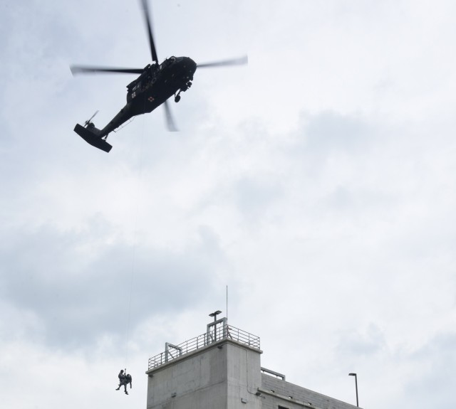 Virginia Guard aviation crews train on rooftop rescue hoists