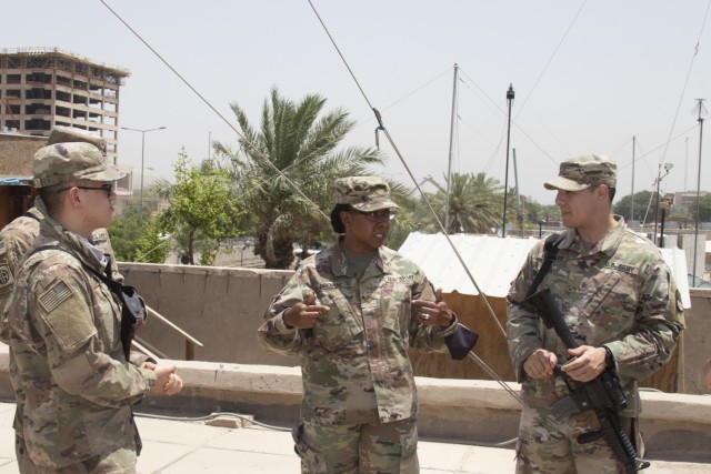 Army Maj. Gloria Brown, Union III COMM-I with the communication provider, 54th Signal Battalion Soldiers, working together to streamline warfighter communication networks in the theater.