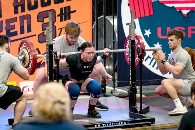 Capt. Erin Harding, 1st Battalion, 5th Aviation Regiment, competes in the squat event at the 2021 United States Powerlifting Association meet in San Antonio, Texas.