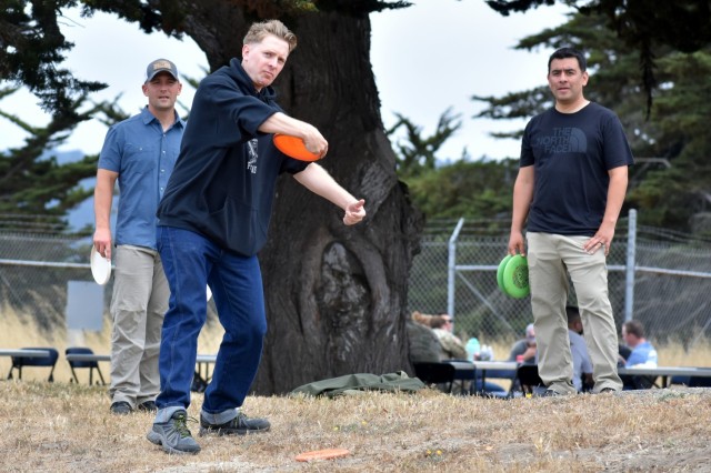 Members of the 229th Military Intelligence Battalion play disc golf during the battalion’s Cadre Appreciation Day at Presidio of Monterey, Calif., July 1.