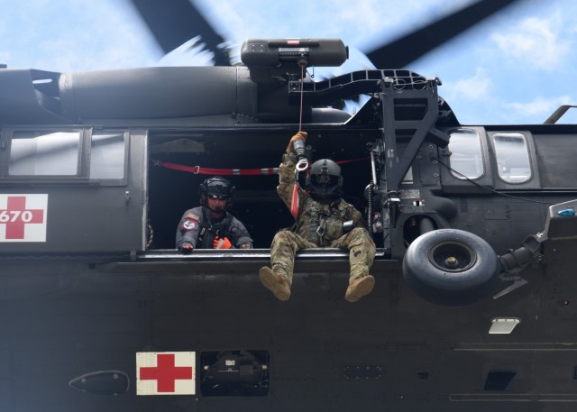 Virginia Guard aviation crews train on rooftop rescue hoists