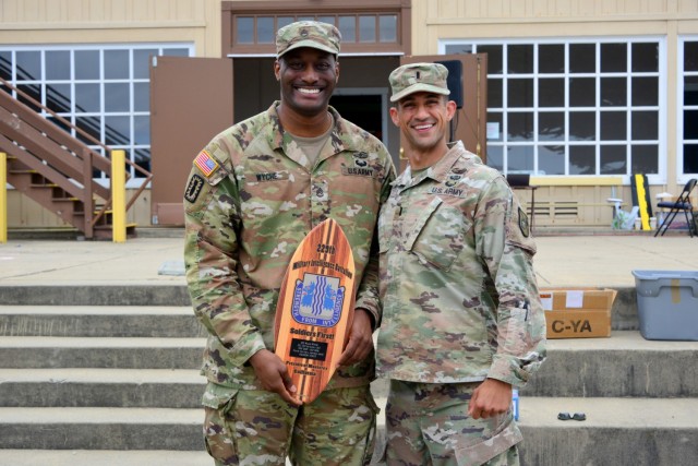 First Lt. Saman Kiani, right, says farewell to Staff Sgt. Willie Wyche during the 229th Military Intelligence Battalion’s Cadre Appreciation Day at Presidio of Monterey, Calif., July 1.