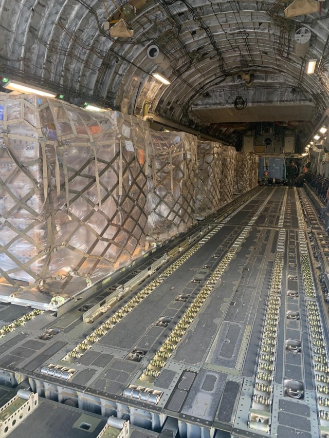 A partially loaded 446th Airlift Wing C-17 Globemaster III headed for Port au Prince, Haiti, June 14, 2021. A Reserve Citizen Airmen crew of the 314th Airlift Squadron transported 101,000 pounds of food to Haiti as part of the Denton Program. Since 1998, the Denton Program has overseen millions of pounds of humanitarian supplies sent to more than 50 countries around the globe. (Courtesy photo provided by Major Eric Hodges)