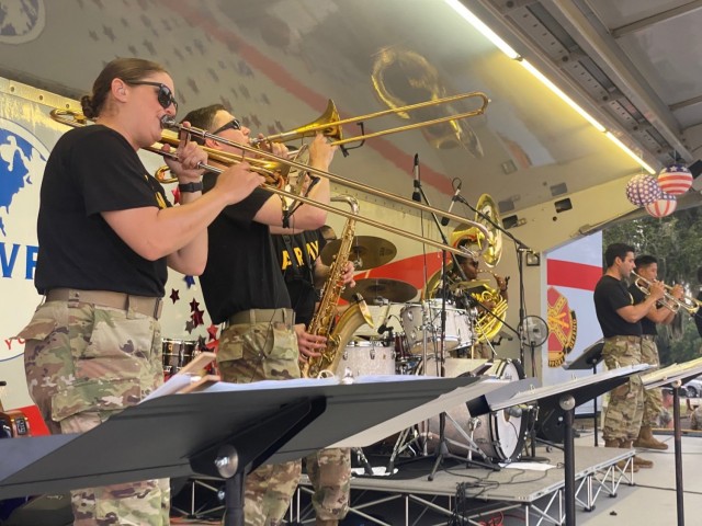 The 3rd Infantry Division Band plays for the Hunter Army Airfield community during the Independence Day Celebration at Hunter Army Airfield, July 3. The MWR hosted event had live music, games, food and fireworks.