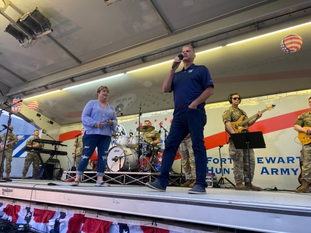 Megan Costanza (left) and Maj. Gen. Charles D. Costanza, greet the audience at Hunter Army Airfield’s Independence Day Celebration, July 3. “4th of July is special...to the veterans, Soldiers and Families, we would not have the 4th of July if it wasn’t for you.”