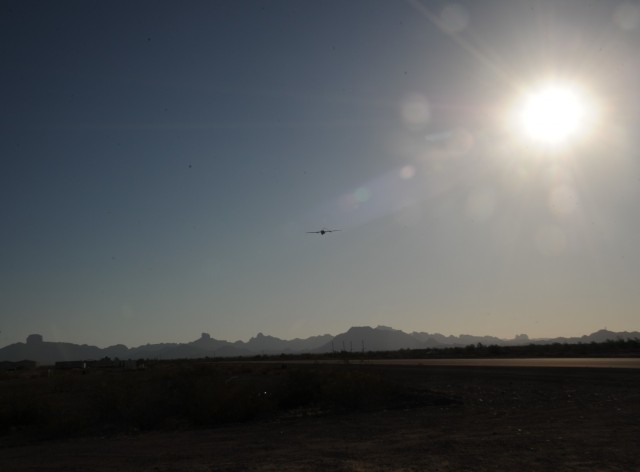 Drones of all types and sizes are tested at Yuma Proving Ground.  The Aerosonde is pictured during a flight with Castle Dome in the background. (Photo by Mark Schauer)