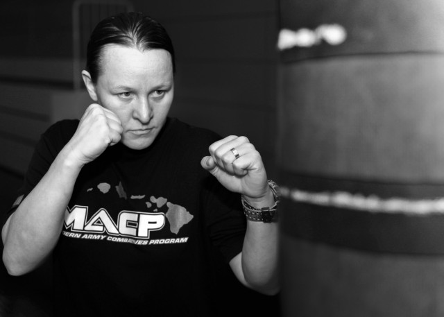 U.S. Army Sgt. Sarah Schneider Chance, a nutrition care specialist at Landstuhl Regional Medical Center, conducts training at Landstuhl Fitness Center, Germany. Prior to enlisting in the U.S. Army, Schneider Chance was a professional Mixed Martial Arts fighter and credits the discipline and teamwork learned from professional fighting for her decision to enlist. 