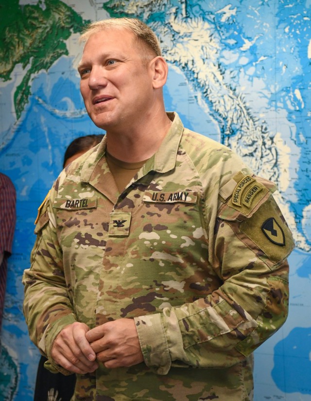 U.S. Army Garrison-Kwajalein Atoll Commander Col. Jeremy Bartel addresses repatriated Marshallese citizens at the Kwaj Lodge in April 2021.