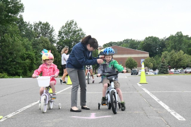Children from the Fort Drum community strapped on their helmets and peddled their way through a safety course July 7 during the annual Bike Rodeo at the Magrath Sports Complex parking lot. Hosted by the Directorate of Family and Morale, Welfare...