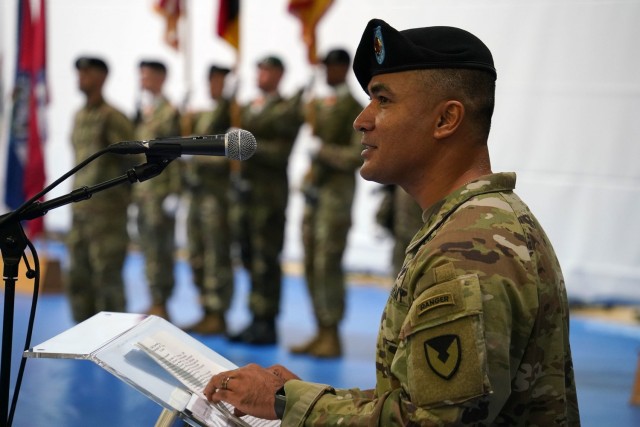 Command Sgt. Maj. Sebastian A. Camacho took the podium during his assumption of responsibility ceremony at the Tower Barracks Physical Fitness Gym, July 9, 2021. (U.S. Army photo by Andreas Kreauzer / USAG Bavaria Public Affairs)