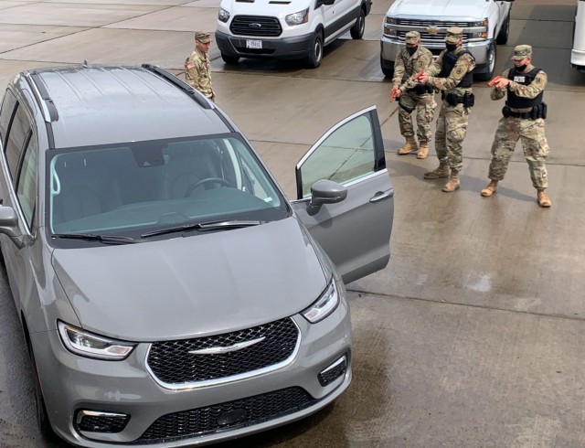 Washington National Guard Soldiers with the 506th Military Police train on a high-risk traffic stop as part of their annual training June 14, 2021, at Camp Murray, Wash. The 506th Military Police focused this year on developing the skills of newer...